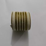 Golden Bangles in white pearls set with 2 Karas